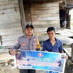 Menggunakan Spanduk Bhabinkamtibmas Himbau Stop Karhutla