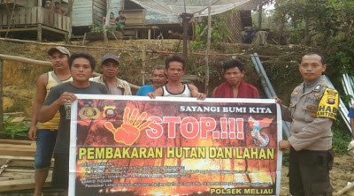 Stop Pembakaran Hutan dan Lahan Bhabinkamtibmas Himbau Gunakan Spanduk