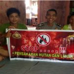 Brigpol B.Y. Simanjuntak Sampaikan Himbauan Kamtibmas Menggunakan Spanduk