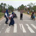 Strong Point Pagi Bripka Sutikno di Depan SMPN 1 Kembayan