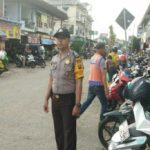 Atur Lalulintas di Pasar Sentral Brigpol Mardiansyah Pastikan Aman