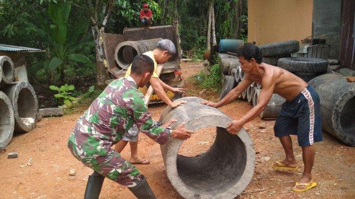 Sukseskan TMMD Kodim Sanggau, Warga Kompak Kerjasama Dengan TNI