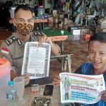 Polsek Entikong Pasang Imbauan Kapolres Sanggau dalam Antisipasi Penyebaran Virus Corona