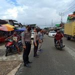 Polsek Sekayam Tingkatkan Pelayanan Lewat Pengamanan Pasar Juadah di Sanggau