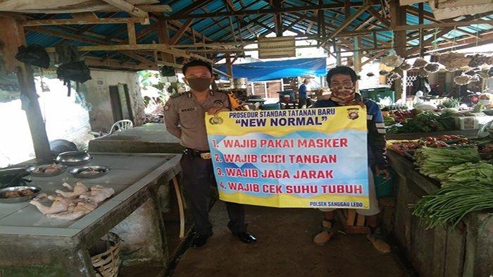 Tangkal Covid-19, Polsek Sanggau Ledo Sosialisasikan New Normal Pada Masyarakat