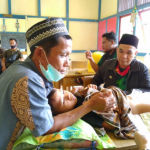 Baznas Sanggau gandeng komunitas milenial gelar bakti sosial di Dusun Balai Nanga