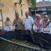 Bhabinkamtibmas Kelurahan Sungai Jawi Dalam Hadiri Panen Raya Budidaya Lele Dukung ketahanan Pangan