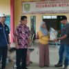 Penyerahan Bantuan Sosial untuk Warga Terdampak Banjir di Kecamatan Noyan