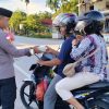 Polsek Parindu Bagikan Takjil untuk Masyarakat di Bulan Ramadhan 1446 H