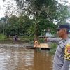 Polsek Mukok Lakukan Monitoring Lokasi Terdampak Banjir di Kecamatan Mukok