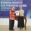 Bupati Sanggau Serahkan Laporan Keuangan Daerah Kepada BPK RI Kalbar