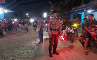Pengamanan Ketat Pawai Obor Malam Idul Fitri 1446 H di Kecamatan Mukok